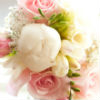 Pink, green, and white hand-tied rose bouquet
